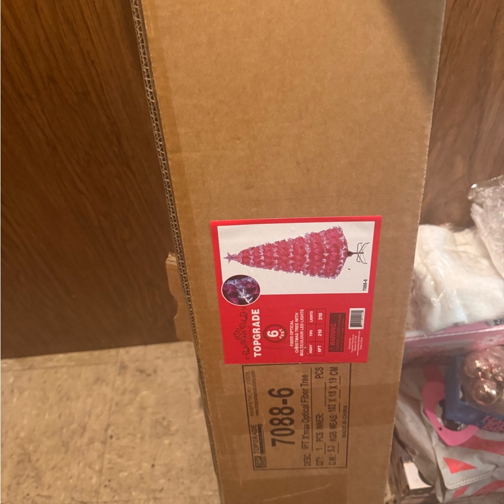 Pink and white Christmas tree in box